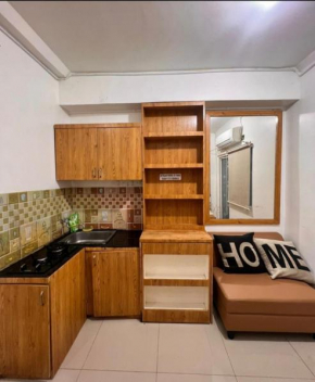 Green pramuka by Santoso Family